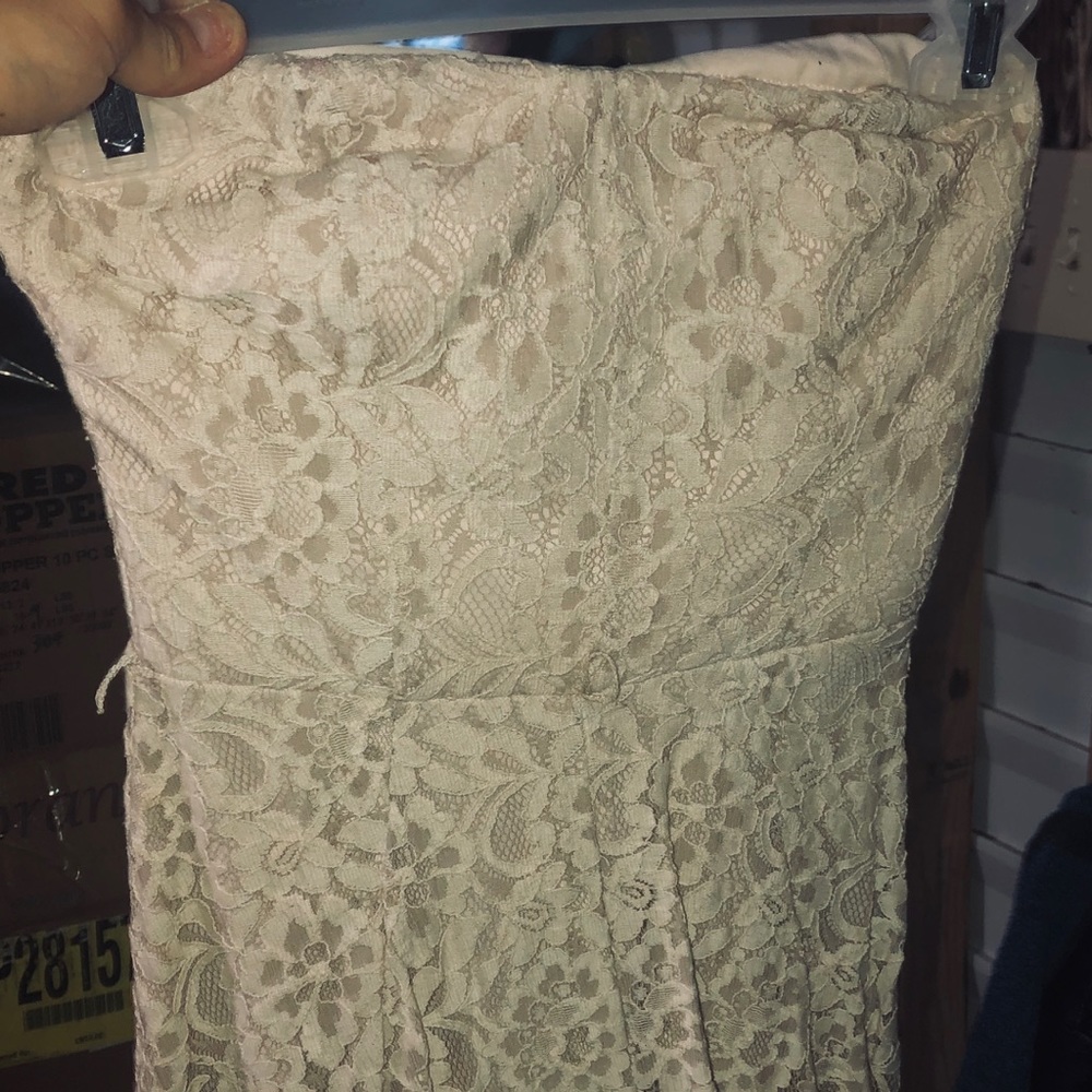 Women’s strapless cream and Lacey summer dress